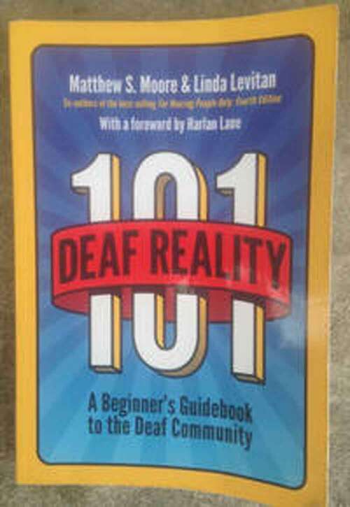 Book cover of Deaf Reality 101: Answers to Some Common Questions About the Deaf Community, Language, and Culture