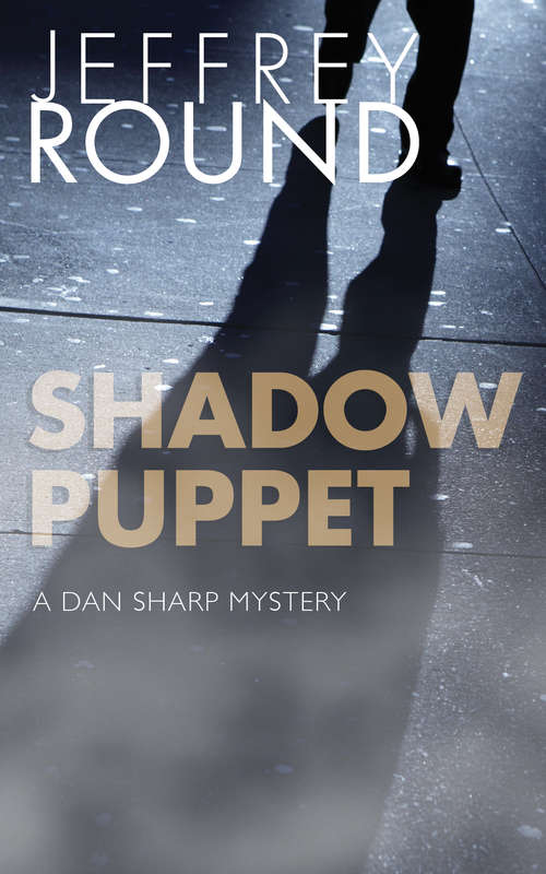 Book cover of Shadow Puppet: A Dan Sharp Mystery (A Dan Sharp Mystery #6)