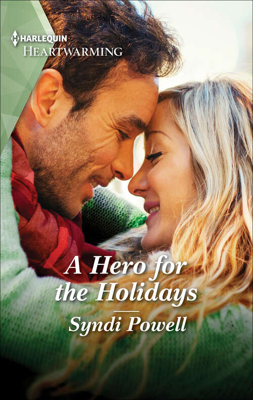 Book cover of A Hero for the Holidays: A Clean Romance (Matchmaker at Work #1)